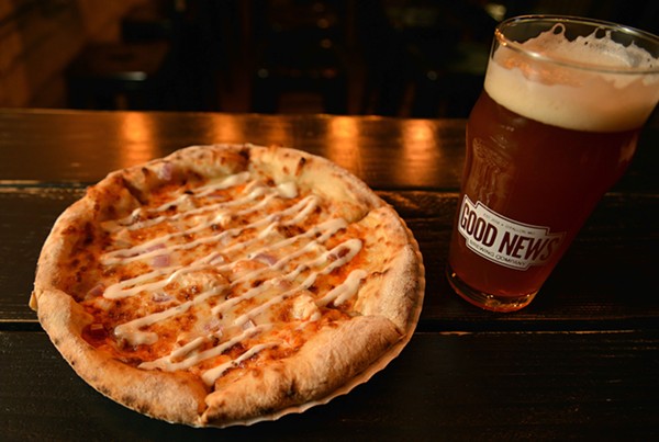Pizza and beer are on the menu at Good News. - TOM HELLAUER