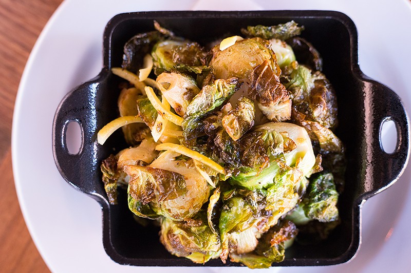 Each steak comes with your choice of side, including flash-fried Brussels sprouts. - MABEL SUEN