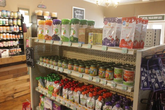 Baby products, which piqued the couple's initial interest in organics, get their own shelf. - Photo by Sarah Fenske