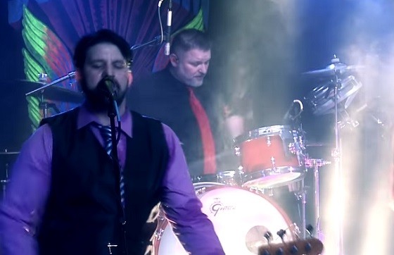 Jeff Gallo and Ken McCray performing in Superjam. - Screenshot from Superjam promotional video.