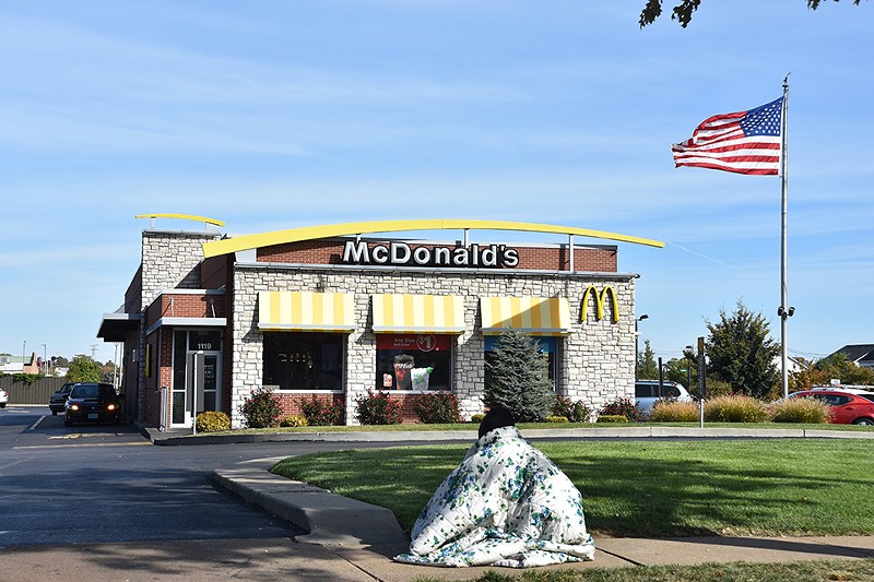 The edge of the McDonald's drive-through is one of Jaz's primary panhandling spots. - DOYLE MURPHY