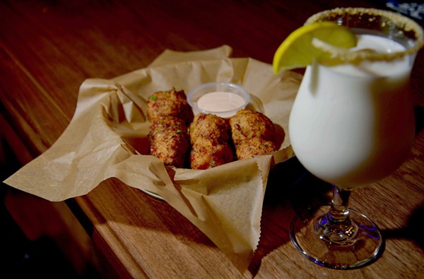Conch fritters with key lime remoulade are available for $12.99. - TOM HELLAUER