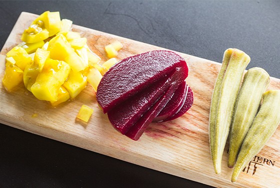 "Southern Pickled Vegetables" features sweet green tomatoes, pickled beets and okra.