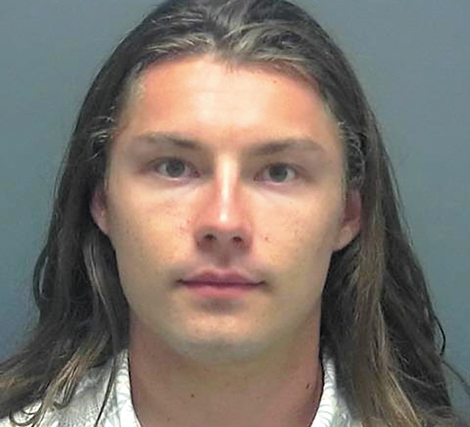 Ellis Athanas III, shown in his mugshot for a 2015 arrest in Florida, had grown his hair to 26 inches before kidnappers shaved his head. - COURTESY LEE COUNTY SHERIFF
