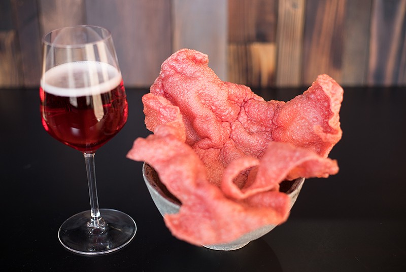 Beet chicharron is paired with fermented potato mousse. - MABEL SUEN