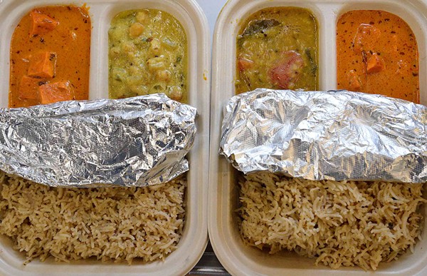 Curry Club's lunch special features two types of curry, a choice of rice and naan wrapped in tin foil. - Tom Hellauer