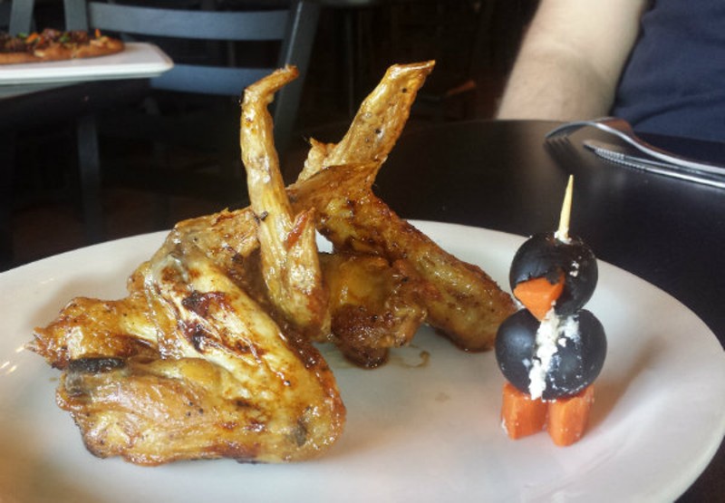 Brickyard's chicken wings come complete with a decorative penguin. - Photo by Samantha Dever