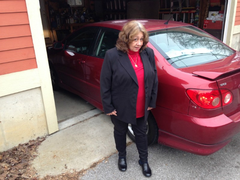 Mary Samuelson told a scammer to scram, but not before he punched two holes in her car. - DOYLE MURPHY
