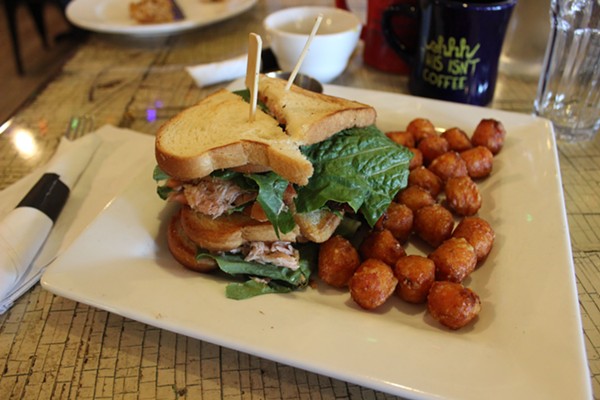 "Up in the club" smoked salmon and bacon sandwich with sweet potato tots. - PHOTO BY LAUREN MILFORD
