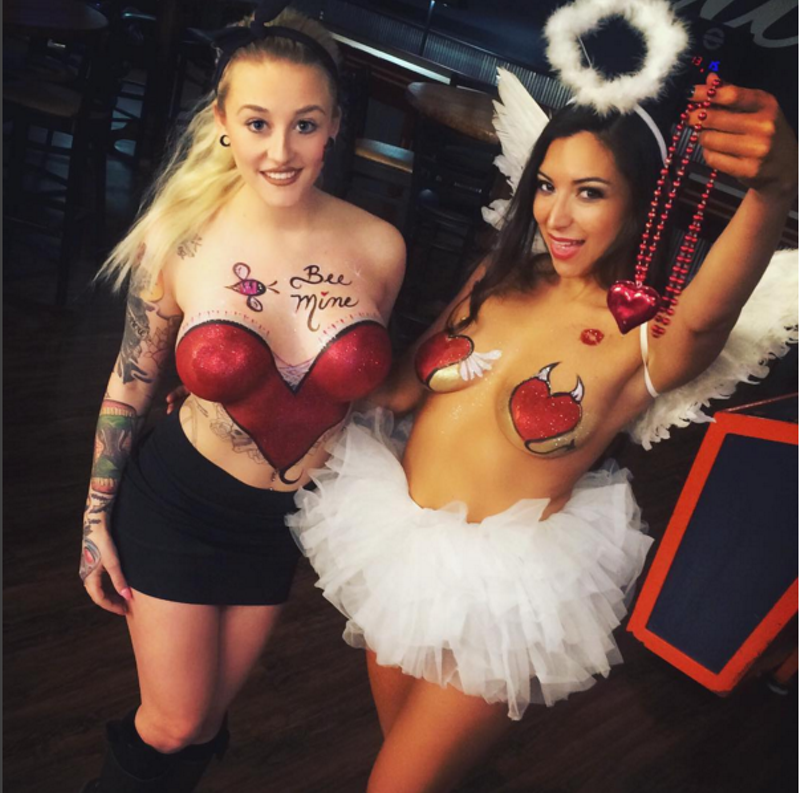 Servers at Social House show off their body paint. - image via Instagram