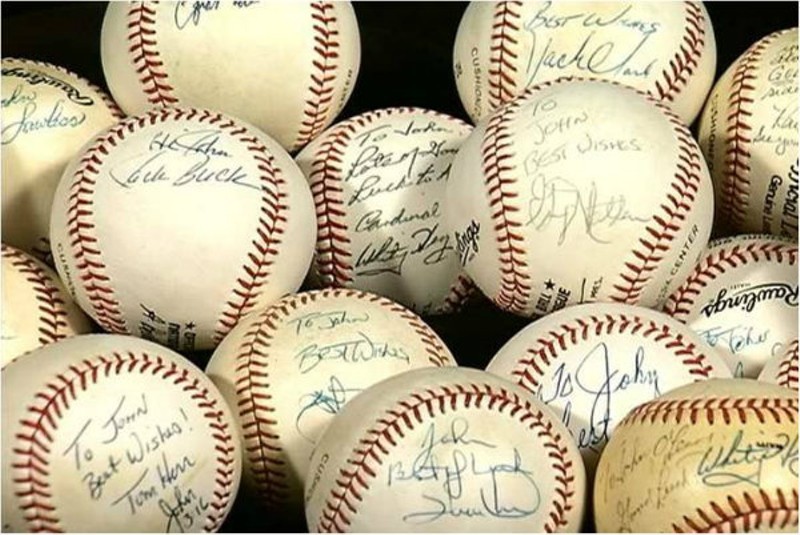 Jack Buck encouraged John to learn how to write again by sending him signed baseballs. - Photo Courtesy of the O'Leary family