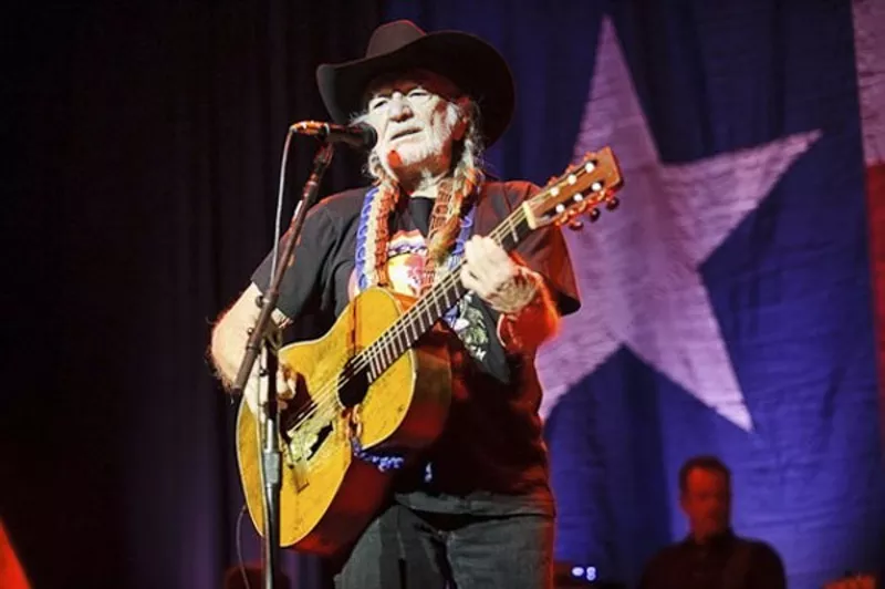 WATCH: Willie Nelson Lights Up in Hilarious New Commercial