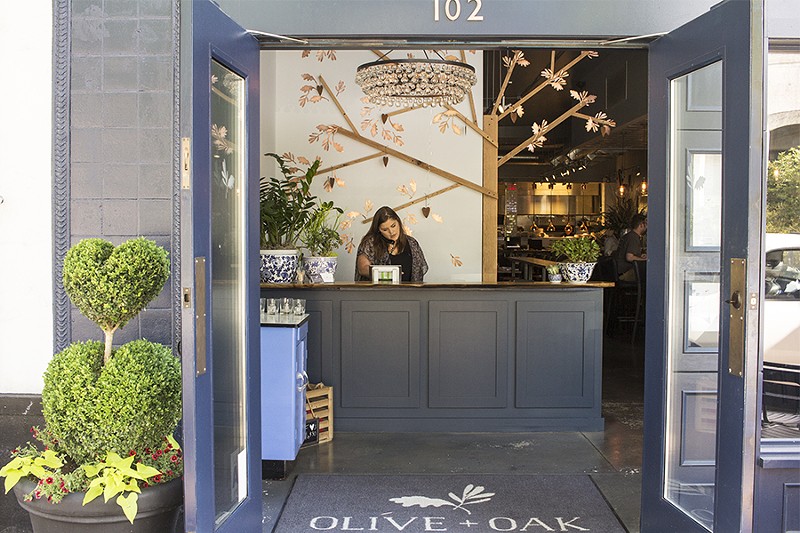 The space takes its name from the co-owner's sons, but also from the mighty olive and oak trees. - PHOTO BY MABEL SUEN
