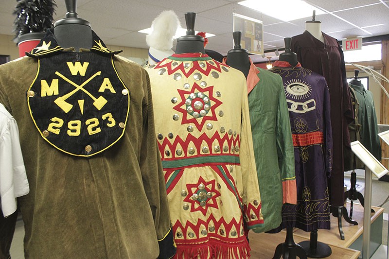 The DeMoulin Museum displays a number of vintage attire and uniforms from fraternal and secret societies. - PHOTO BY ALLISON BABKA