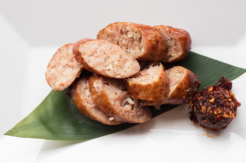Lao sausage comes with a side of spicy chile paste. - MABEL SUEN