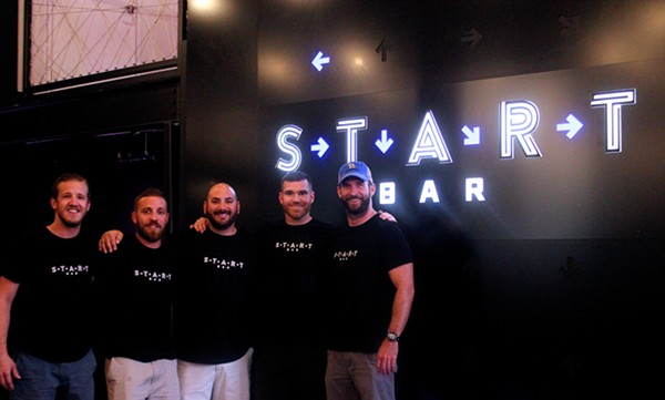 Chef Nick Del Gaiso (center) cracks a smile with Start Bar owners and contributors. - PHOTO BY NATALIE RAO