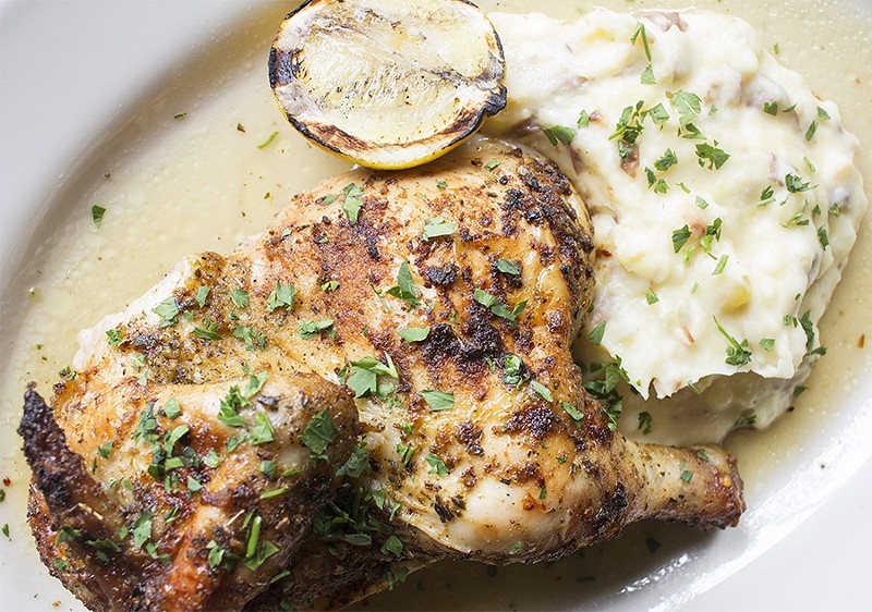 Beer-can chicken with Weber's beer-can chicken seasoning, fresh herbs and garlic mashed potatoes. - PHOTO BY MABEL SUEN