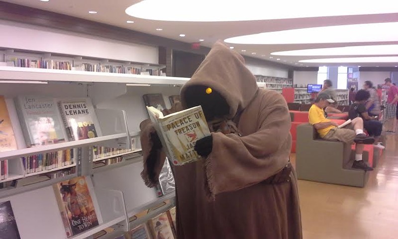A jawa caught up on some light reading at last year's Comic Con. - Riva Stewart