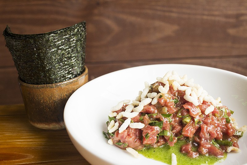 Beef tartare with parsley, fermented garlic, pickles and nori. - PHOTO BY MABEL SUEN