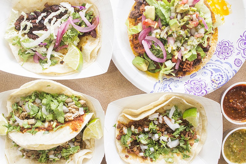 A selection of tacos from Sabor Si: Korean barbecue pork, the "Dirty Pig" tostada, chicken, beef and chorizo. - PHOTO BY MABEL SUEN