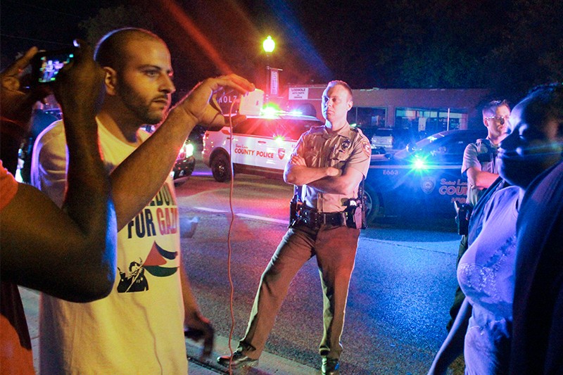 Bassem Masri, left, was a notable livestreamer during the Ferguson protests of 2014. - DANNY WICENTOWSKI