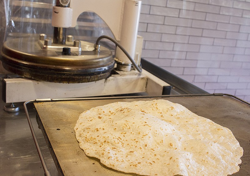 Tortillas are made fresh for each order. - PHOTO BY MABEL SUEN