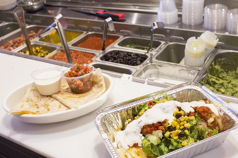 Dishes are compiled Chipotle-style; walk down the assembly line and watch them being prepared to order. - PHOTO BY MABEL SUEN