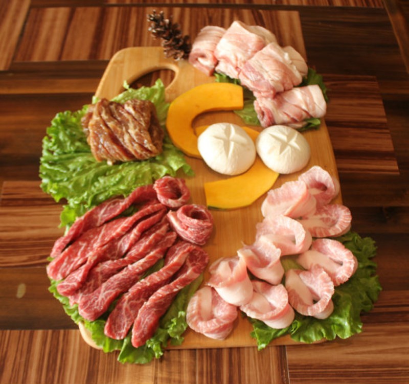 The "Beef and Pork" combination platter includes kalbi, rib-eye, pork belly and pork jowl. - CHERYL BAEHR