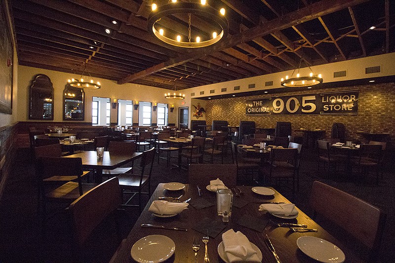 The main dining area has a dimly lit vibe. - PHOTO BY MABEL SUEN