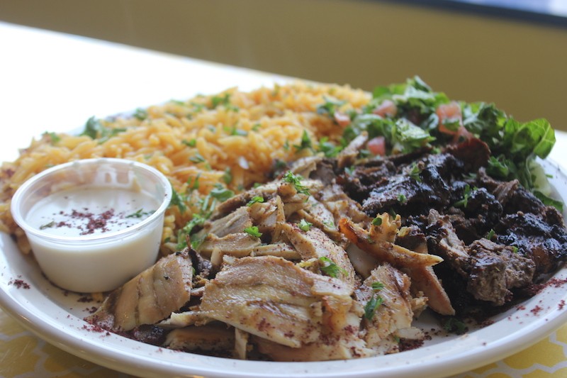 The mix shawarma and rice, a platter that also comes with a small salad and tahini sauce. - PHOTO BY SARAH FENSKE