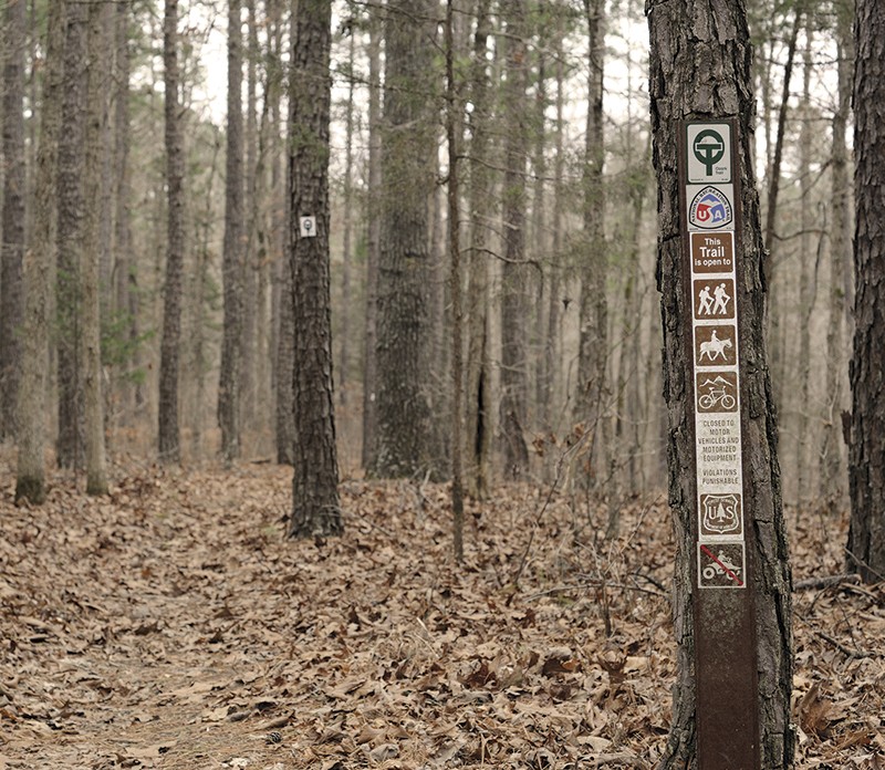 Clear markers guide hikers along the trail, even when it passes through private property. - PHOTO BY KELLY GLUECK