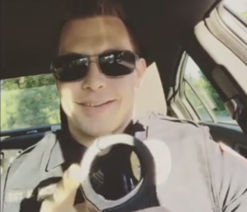 Ex-officer Mike Weston plays with his handcuffs in one of his Instagram posts. - INSTAGRAM