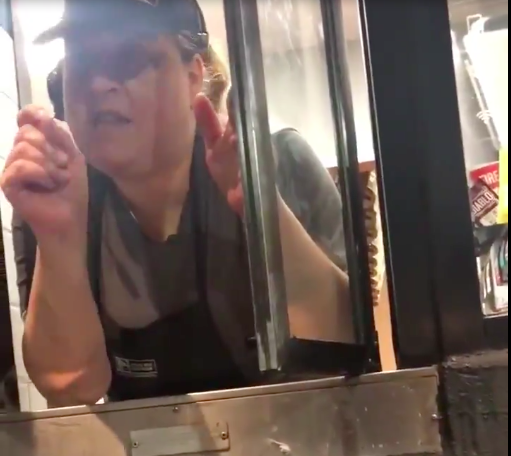 A Taco Bell drive-through worker was caught on video. - SCREENSHOT VIA TWITTER