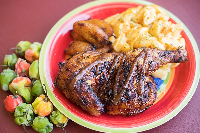 “Judah's Jerk Entree” is served with plantains and mac and cheese. - MABEL SUEN