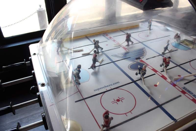 The Blues are featured in the bubble hockey game. - KATIE COUNTS
