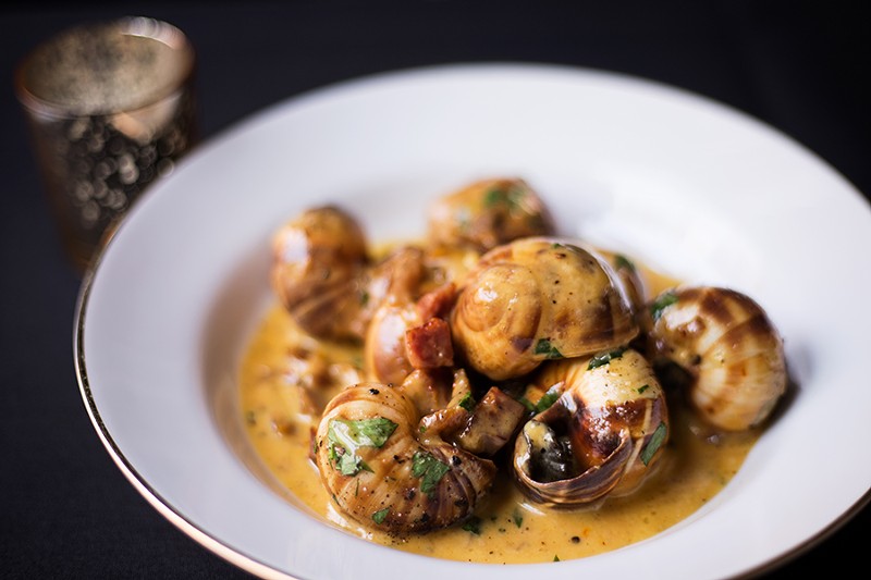 Escargot are served in the shell with Spanish chorizo, caramelized fennel, Madeira and saffron-garlic butter. - MABEL SUEN