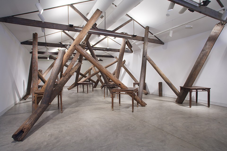 Ai Weiwei (Chinese, b. 1957), Through, 2007–8. Wooden tables and beams and pillars from dismantled temples from the Qing dynasty (1644–1912), 216 9/16 x 334 5/8 x 543 5/16" (550 x 850 x 1380 cm.) Courtesy of Ai Weiwei Studio. - AI WEIWEI 2012. COURTESY OF AI WEIWEI STUDIO