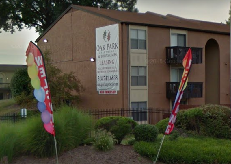 A thirteen-year-old was walking by Oak Park Apartments when he was shot, police say. - GOOGLE STREET VIEW