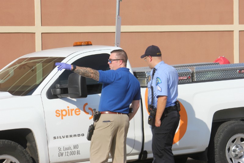 St. Louis police check out a stolen Spire truck. - DOYLE MURPHY