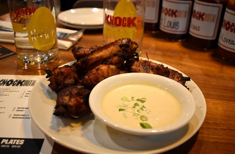 The smoked wings plate comes with a pound of crispy wings with Alabama-style white sauce. - LIZ MILLER
