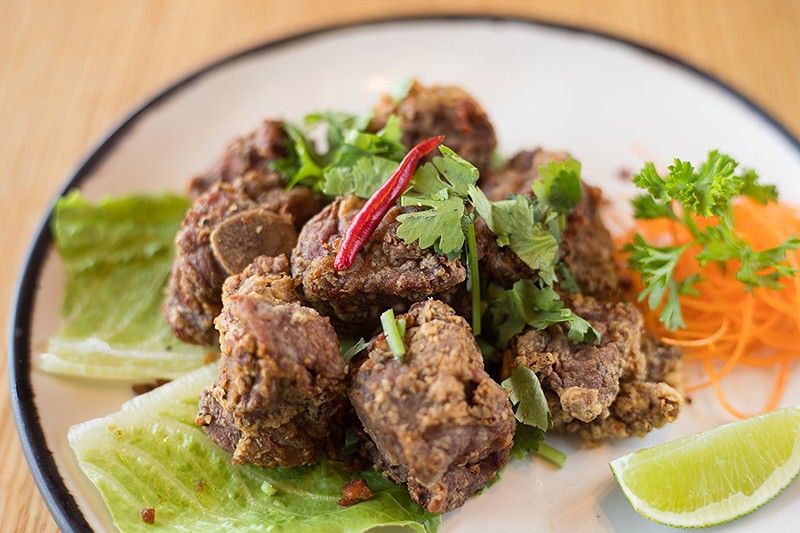 Before being breaded and fried, the pork riblets are marinated in soy, garlic and Golden Mountain sauce (a Thai sauce made from fermented soybeans), which imbues the meat with umami. - MABEL SUEN