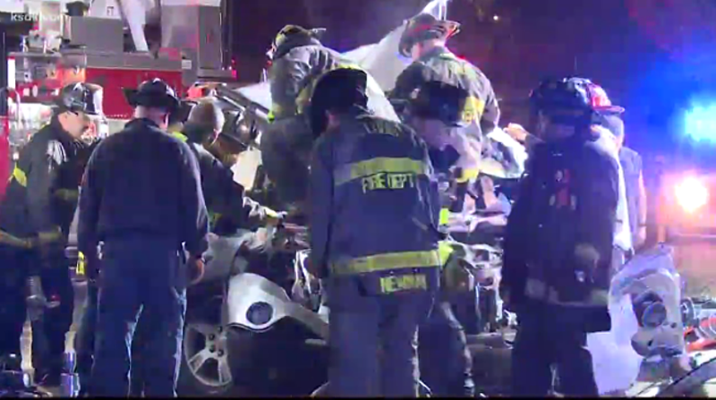 Firefighters at the scene of Tuesday's deadly crash. - SCREENSHOT FROM KSDK'S REPORT