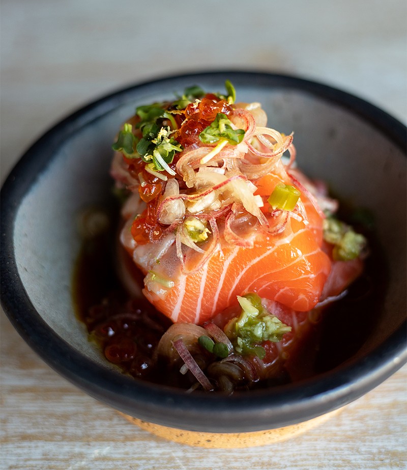 Salmon sashimi in ponzu sauce with marinated salmon roe. - MABEL SUEN