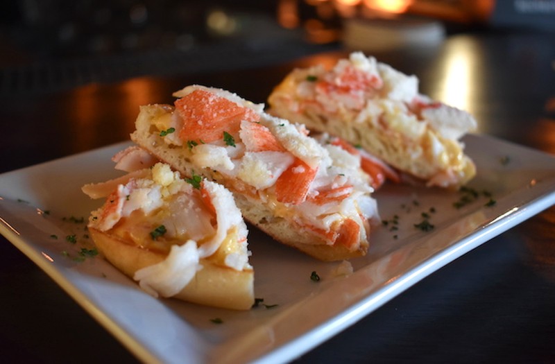 Krabby Crab Puffs with cheese spread, fresh crab and a horseradish cheese on an English muffin. - LIZ MILLER