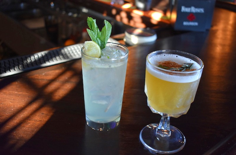 The She Bad gin cocktail (left) with St. Germain, house sour mix, mint and ginger beer. - LIZ MILLER