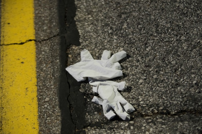 Cleaning up now includes picking up customers' discarded gloves. - TRENTON ALMGREN-DAVIS