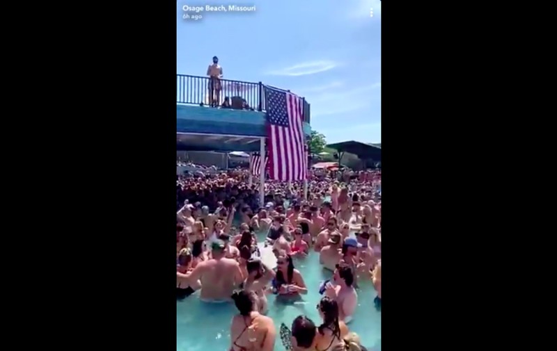 St. Louis County issued a travel advisory after videos (screengrab posted  above) showed crowds of people partying at Lake of the Ozarks bars. - SCREENGRAB VIA TWITTER