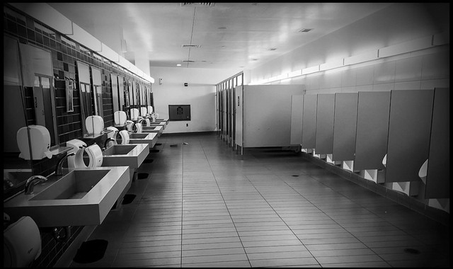 The Chesapeake House Travel Plaza on I-95 in Port Deposit, Maryland, is void of people on Sunday night, March 22. "I made the empty men’s room image first because it immediately reminded me of the scene from The Shining." - CHET GORDON