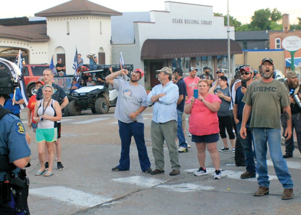 Activists at Fredericktown’s June 24 protest were met with racist taunts from counterprotesters, like this gesture graphically depicting the act of lynching. - ADAM HAMLIN
