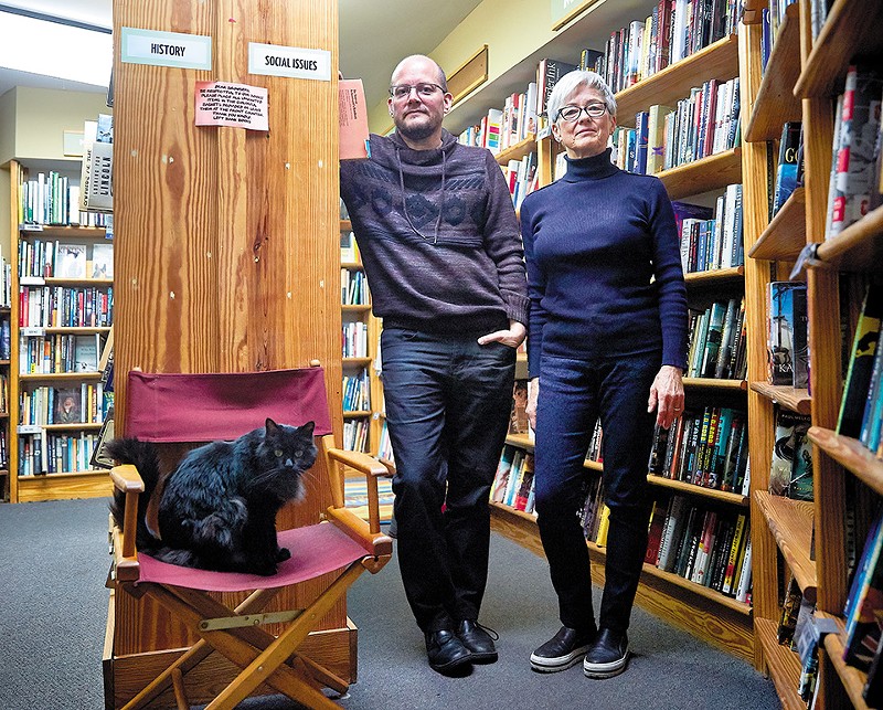 Left Bank Books co-owners Jarek Steele and Kris Kleindienst (with Spike, left) aren't just selling books. They're also creating community. - THEO WELLING